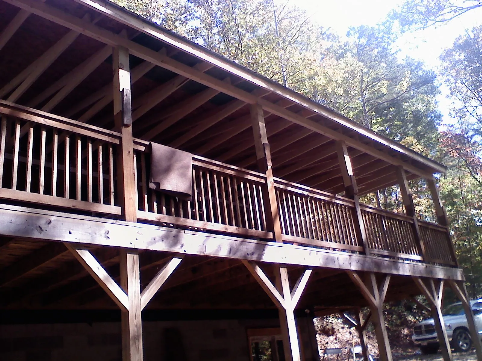 Timber framing under a new elevated porch and deck — Roof Leak Repair in Davilla by Roofing Brothers